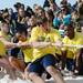 Michigan cheerleaders battle a co-ed team of South Carolina cheerleaders during a tug-o-war at beach day in Clearwater, Fla. on Sunday, Dec. 30. Melanie Maxwell I AnnArbor.com